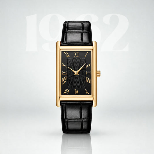 1962 gold Art Deco tank watch, black guilloche dial with gold Roman numerals on a black leather strap