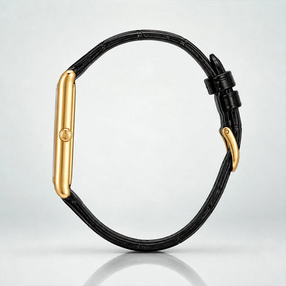 Side profile of the 1962 gold tank case and black crocodile-embossed genuine leather strap